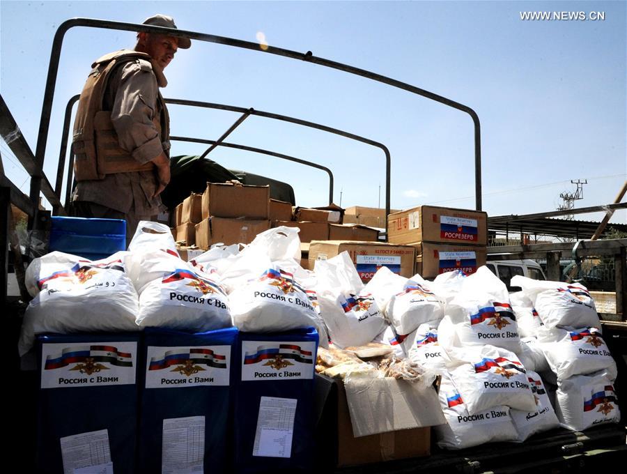 SYRIA-DAMASCUS-RUSSIAN-AID-DELIVERY
