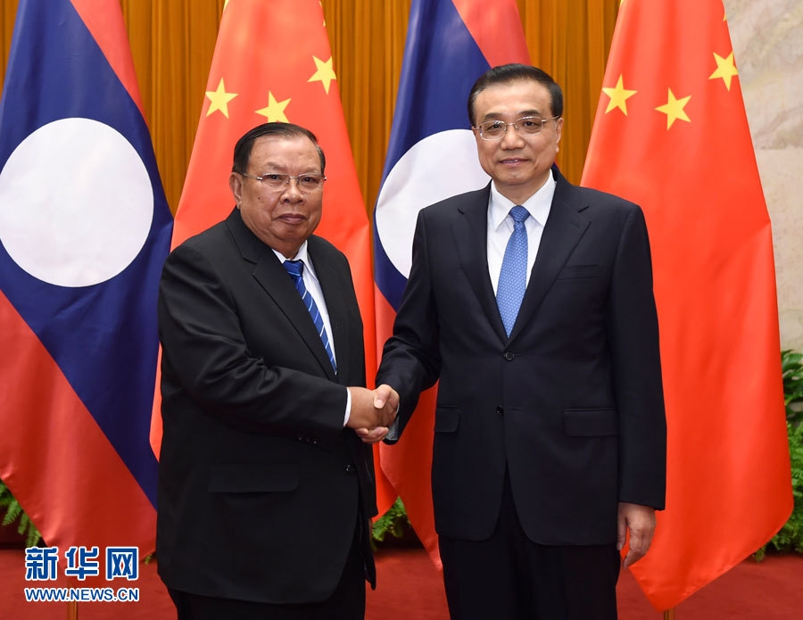 رئيس مجلس الدولة الصيني يلتقي بالأمين العام للجنة المركزية لحزب الشعب الثوري اللاوسي
