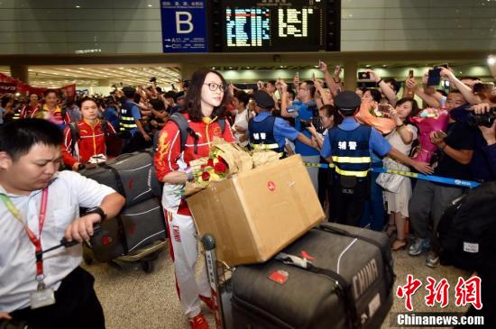 الرياضيون الصينيون يعودون إلى بلادهم