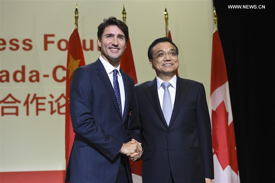 （时政）李克强与加拿大总理特鲁多共同出席第六届中加经贸合作论坛并致辞