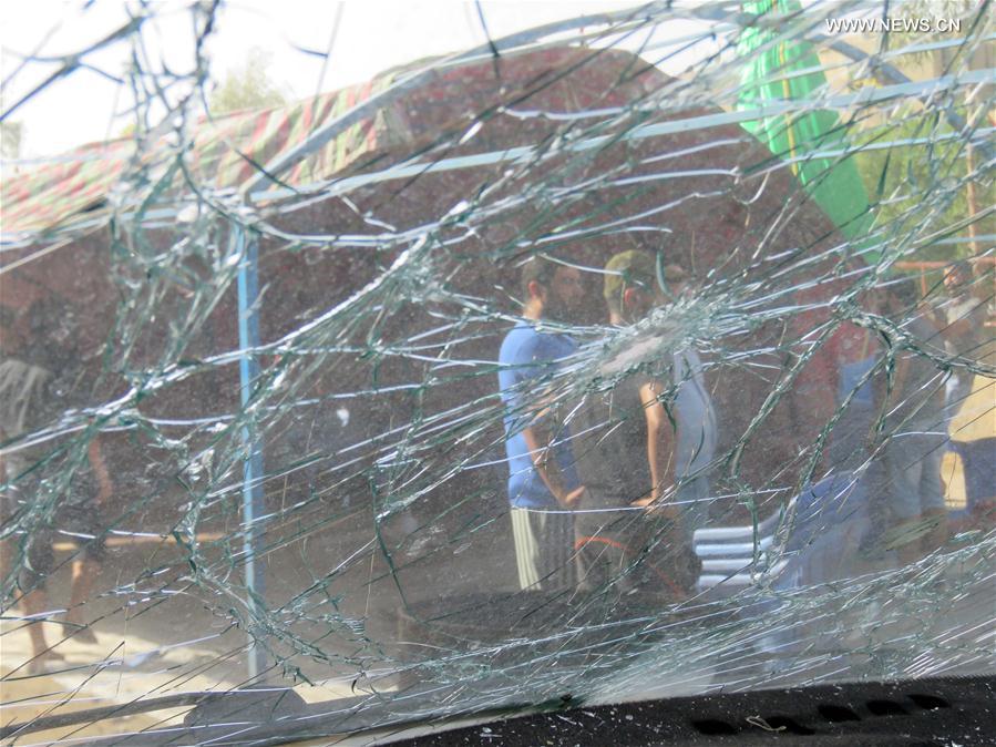 الصورة: ارتفاع حصيلة تفجير انتحاري شمال شرقي بغداد الى 32 قتيلا