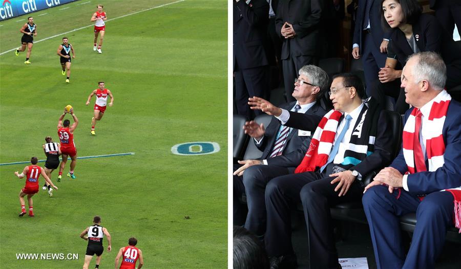 （时政）李克强与澳大利亚总理特恩布尔共同观看澳式足球
