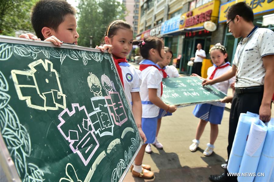 الصورة: الصين تزيد نسبة المواطنين الذين يتحدثون لغة الماندرين إلى 80 بالمائة