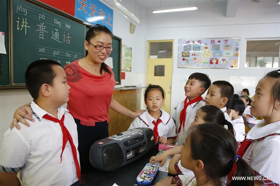 الصورة: الصين تزيد نسبة المواطنين الذين يتحدثون لغة الماندرين إلى 80 بالمائة
