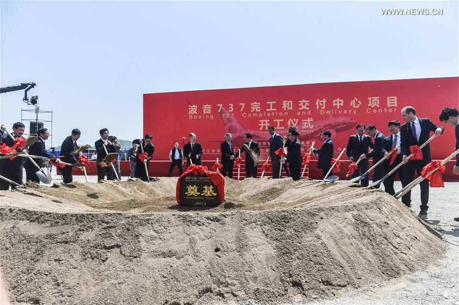 الصورة: حفل وضع حجر الأساس لمركز الإكمال والتسليم لبوينغ 737 بشرقي الصين