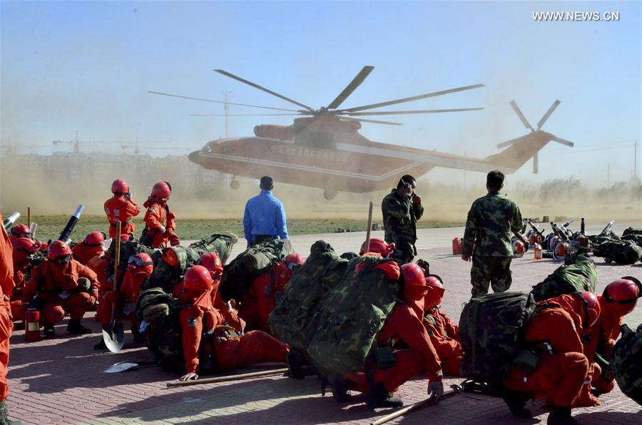 الصورة: أكثر من 1600 شخص يحاربون حريق غابات في شمالي الصين