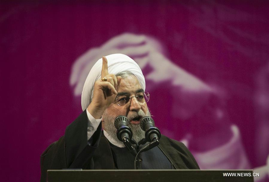الصورة: روحاني يفوز بالانتخابات الرئاسية الإيرانية