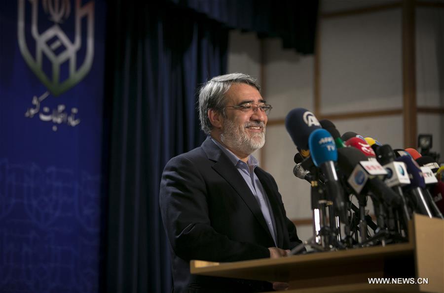 الصورة: روحاني يفوز بالانتخابات الرئاسية الإيرانية