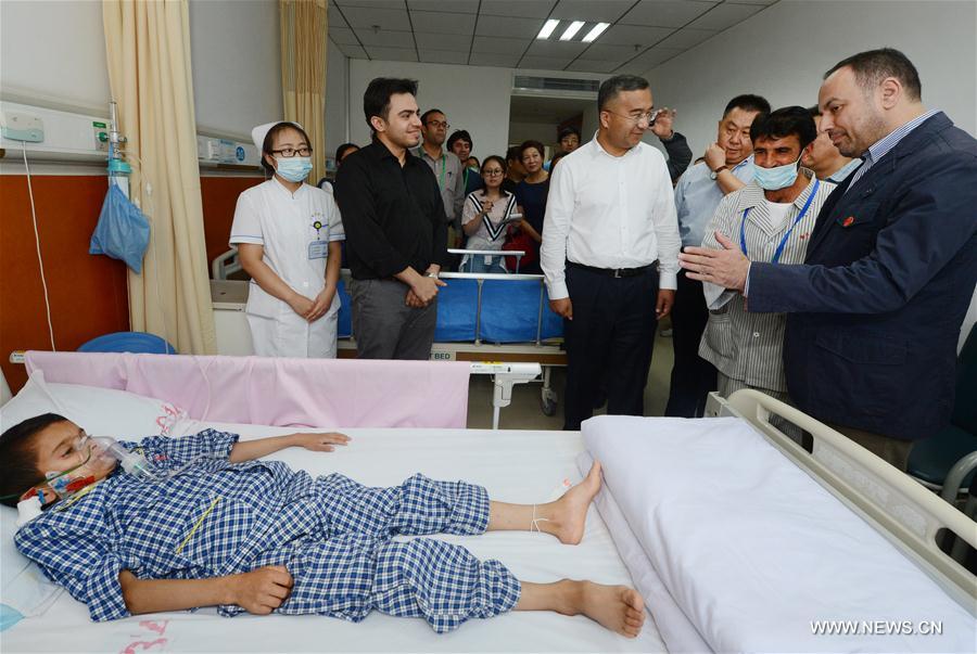 الصورة : الصين توفر العلاج لـ 21 طفلا أفغانيا يعانون أمراضا قلبية خلقية