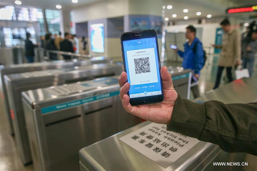 （图文互动）（2）上海磁浮线试运行手机“刷码过闸”　明年或覆盖上海地铁全网络　