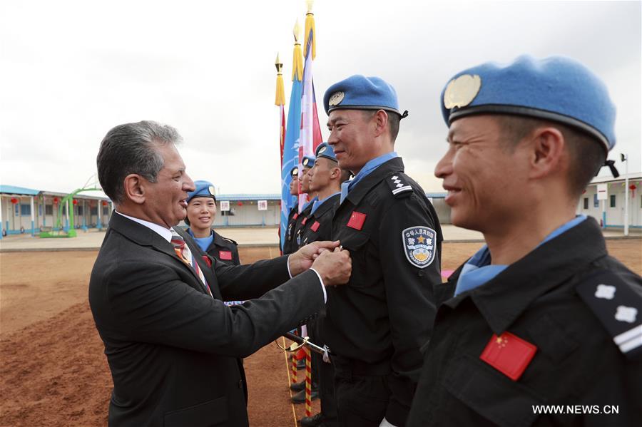 （国际·图文互动）（1）联合国授予中国第五支驻利比里亚维和警察防暴队全体队员和平勋章