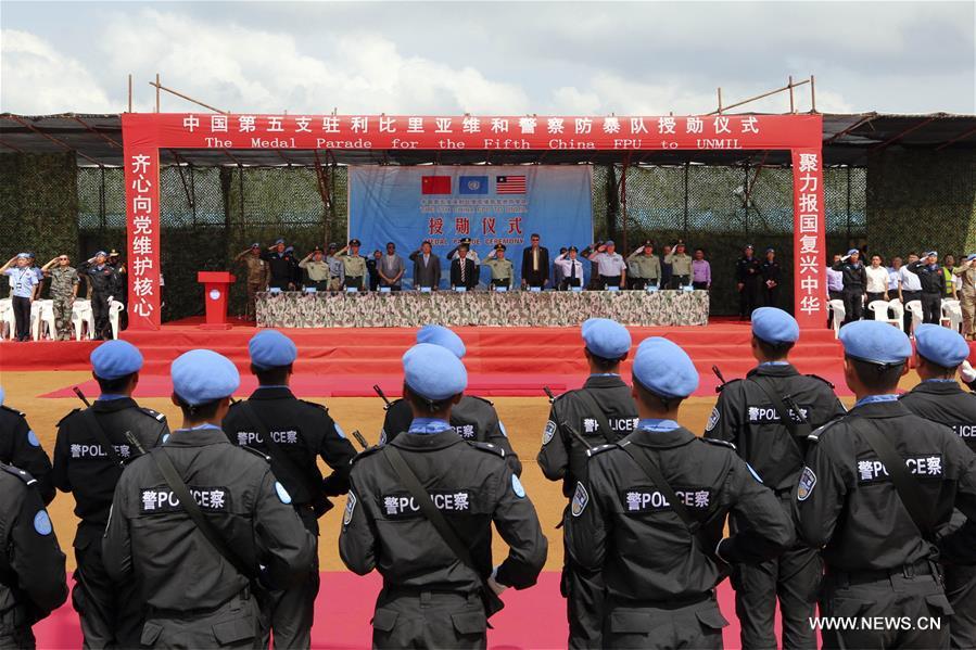 （国际·图文互动）（2）联合国授予中国第五支驻利比里亚维和警察防暴队全体队员和平勋章