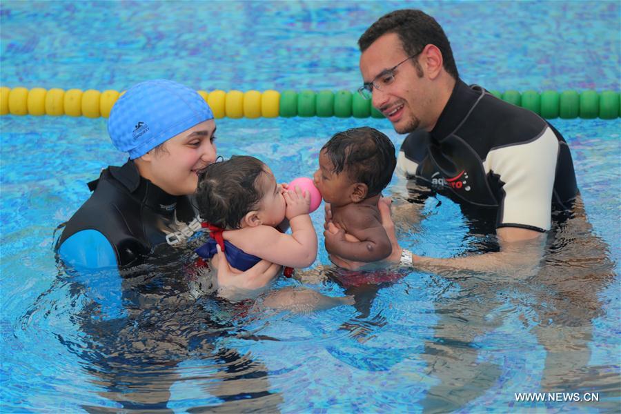 EGYPT-CAIRO-BABY SWIMMING