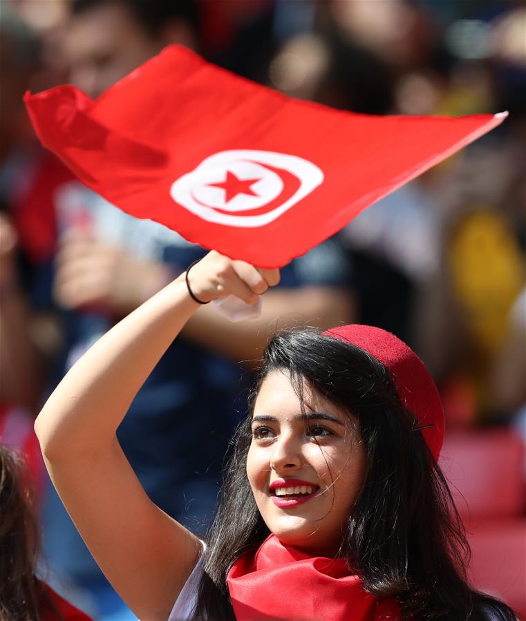 الصورة: مشجعة تونسية في مباراة كأس العالم بين بلجيكا وتونس