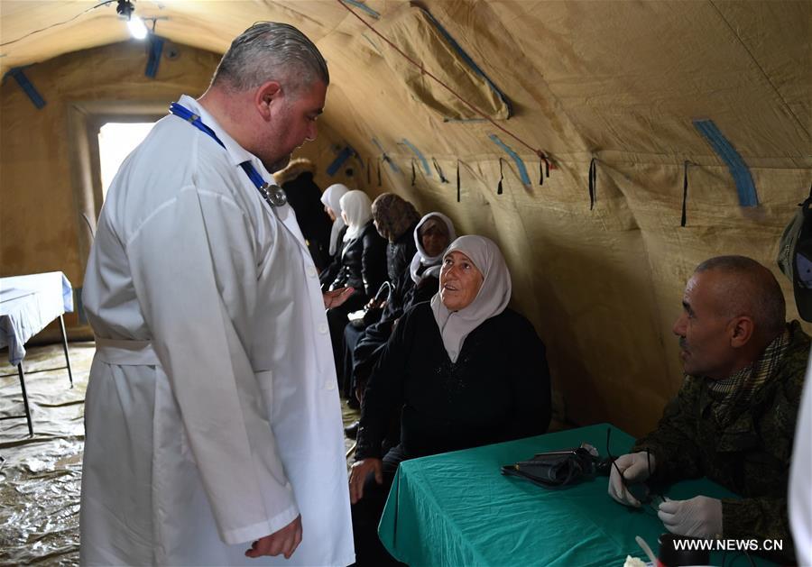 الصورة : عودة مشردين سوريين بمحافظة إدلب السورية 