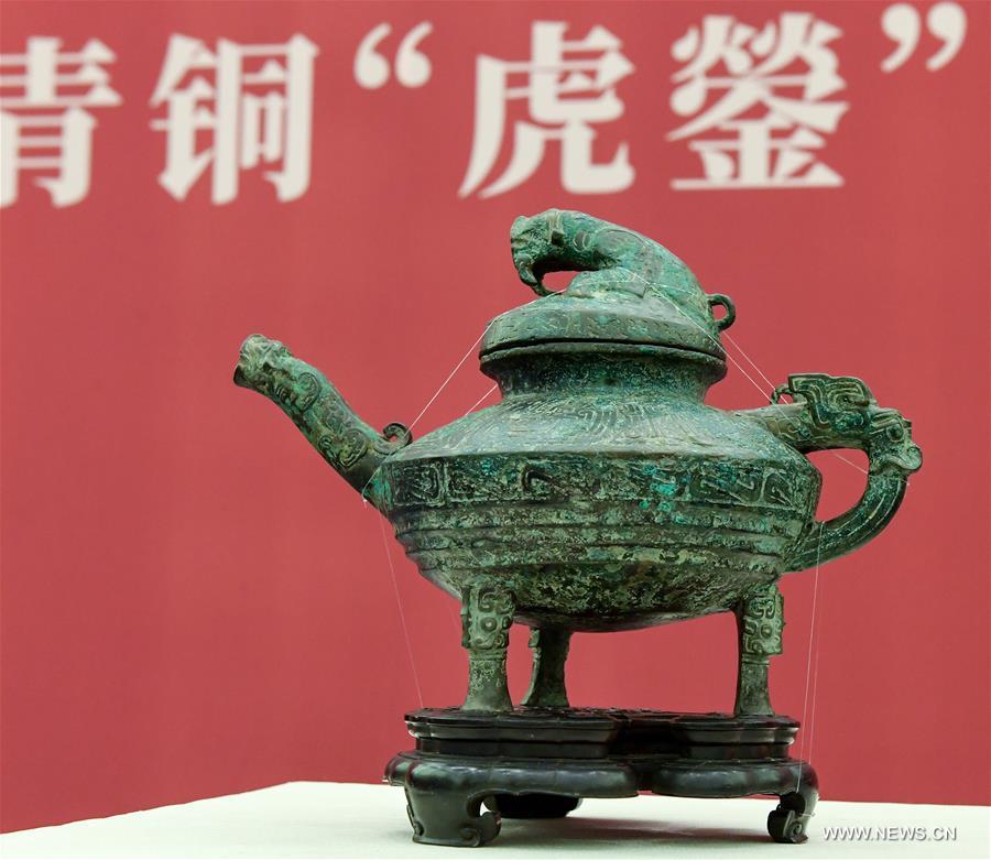 الصورة: عودة قطعة برونزية أثرية مسروقة تسمى "هويينغ" إلى الصين