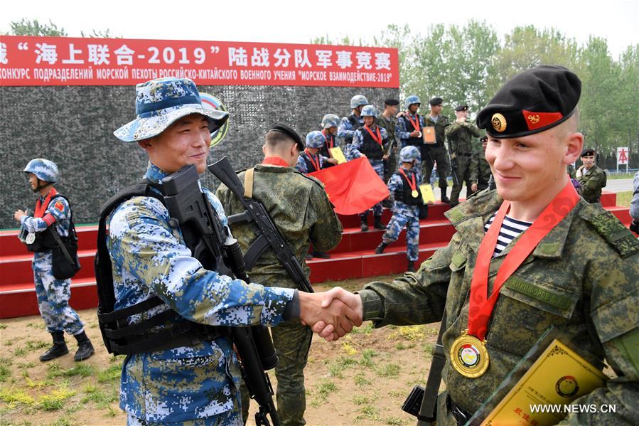 الصورة: مسابقات عسكرية برية في التدريبات العسكرية المشتركة بين الصين وروسيا 