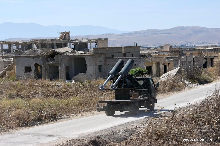 الصورة: الجيش السوري يستعيد السيطرة على بلدة "كفر نبودة" بمحافظة حماة وسط سوريا