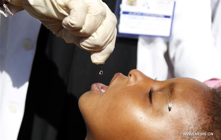 الصورة: حملة للتطعيم ضد مرض شلل الأطفال في صنعاء، اليمن