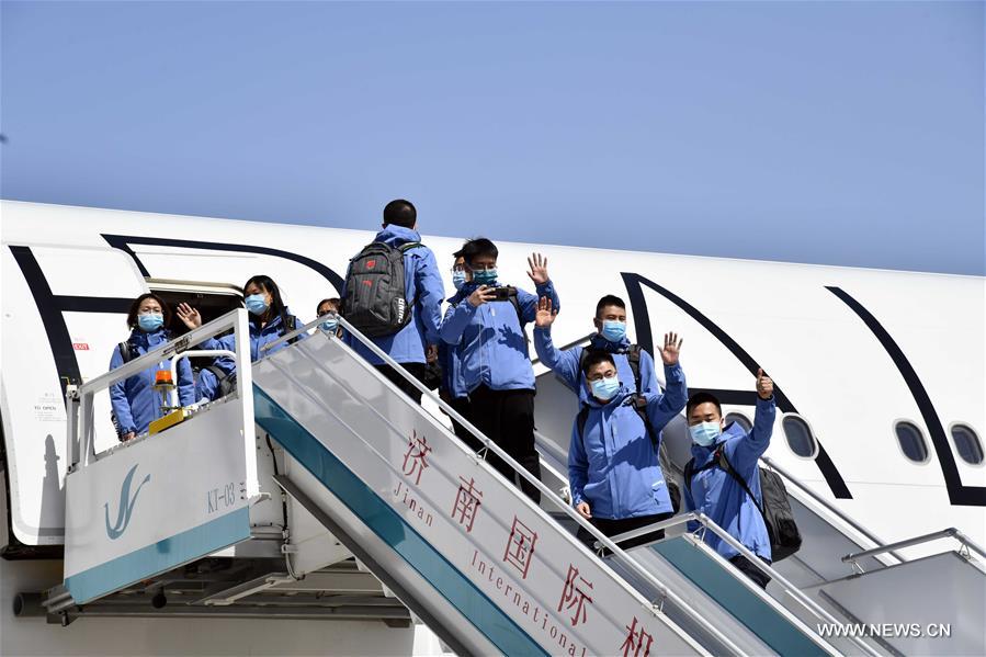 الصورة: فريق عمل من مقاطعة بشرقي الصين يتوجه إلى بريطانيا من أجل مكافحة فيروس كورونا الجديد