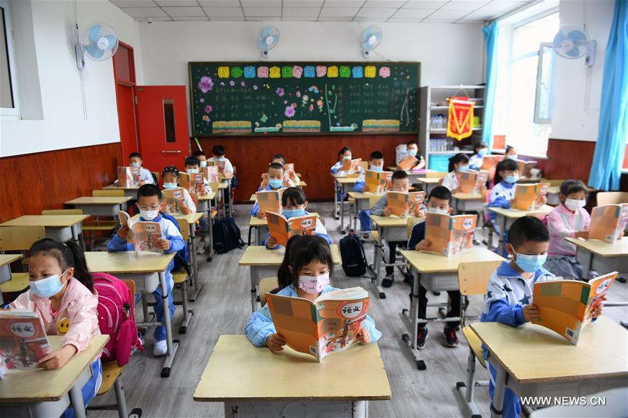 الصورة: استئناف الفصل الدراسي لطلاب الصفين الأول والثاني الابتدائي في مدينة تشانغتشون شمال شرقي الصين 
