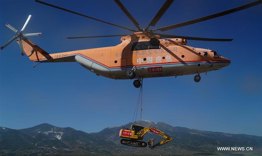 الصورة : طريق معبد يربط قرية جبلية نائية في جنوب غربي الصين مع العالم خارجها