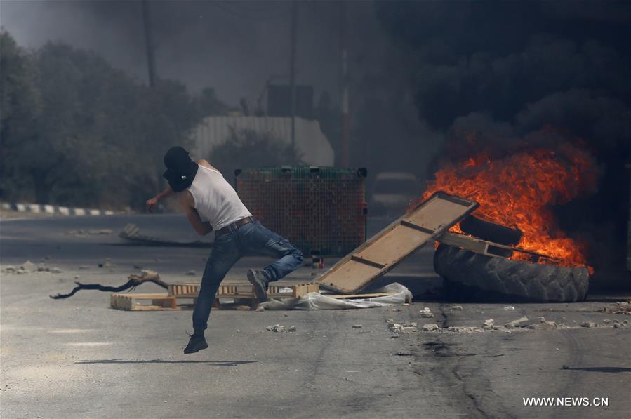 الصورة: اشتباكات في سلفيت بالضفة الغربية 