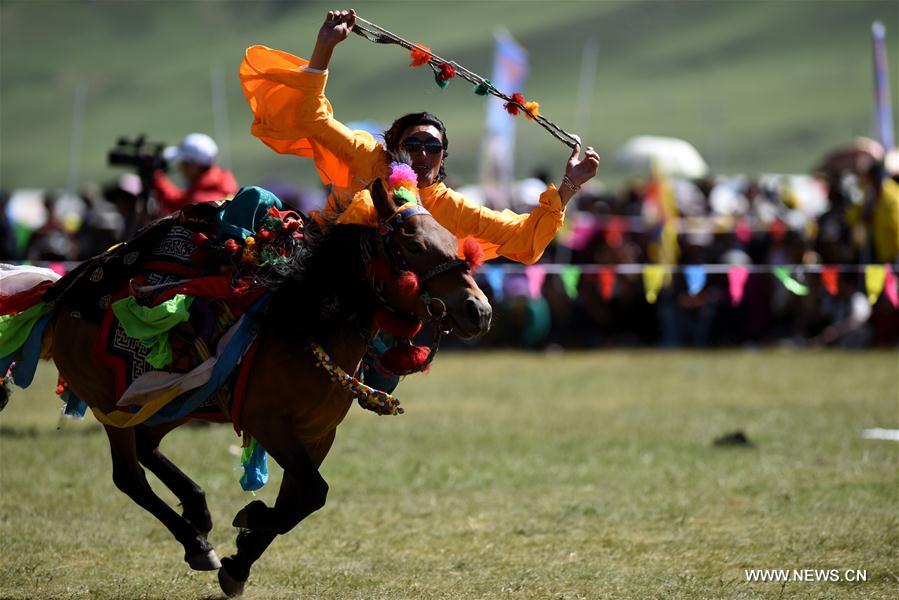 الصورة: المسابقات الرياضية الجماهيرية على مرج هضبة تشينغهاي-التبت