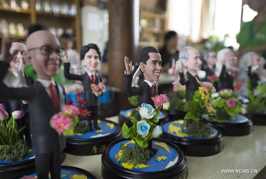  الصورة: تماثيل لمسؤولين مشاركين في قمة مجموعة العشرين في هانغتشو شرقي الصين