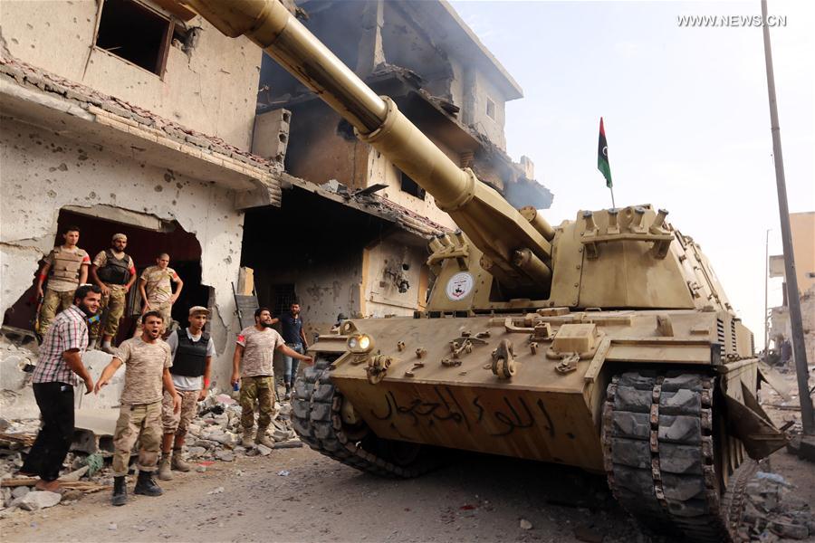 الصورة: القوات الموالية للحكومة الليبية تتقدم في سرت لاستعادتها من "داعش"