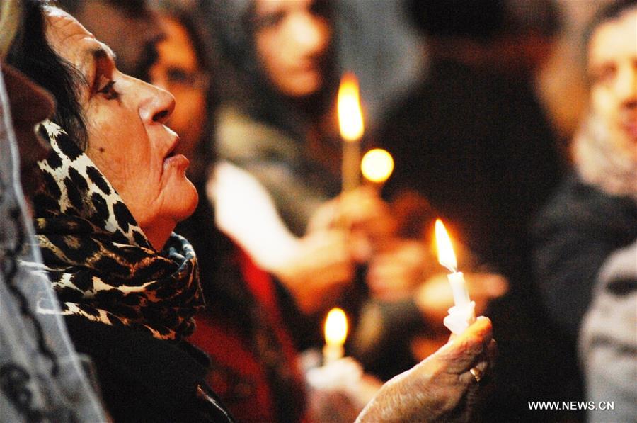 الصورة: قداس الكريسماس في بلدة برطلة العراقية