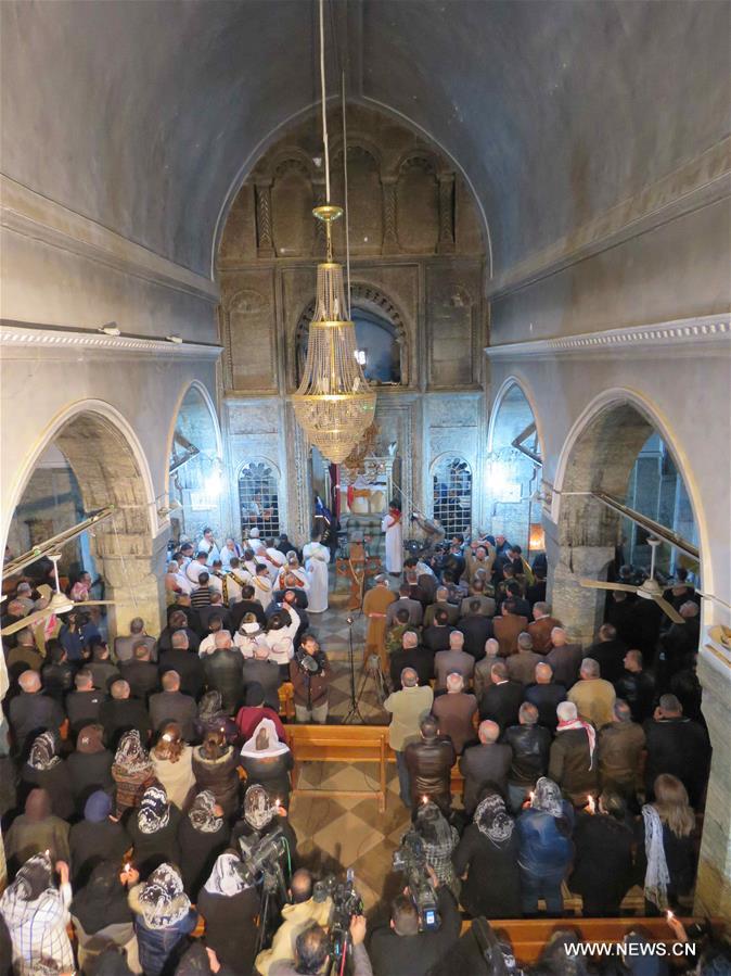 الصورة: قداس الكريسماس في بلدة برطلة العراقية