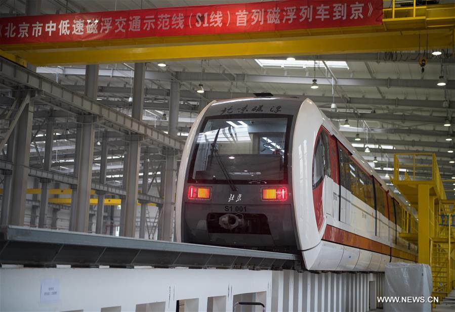 الصورة: أول قطار مغناطيسي معلق متوسط ومنخفض السرعة في بكين