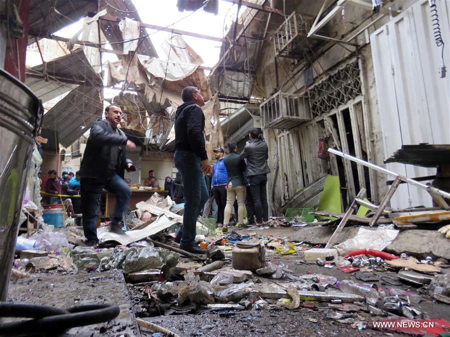 الصورة: مقتل 28 وإصابة 53 بانفجارين وسط بغداد