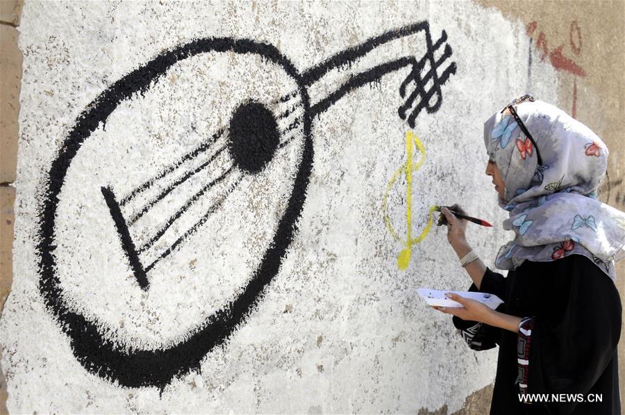 الصورة: حملة للتعبير باستخدام الرسم عن آمال اليمنيين في إحلال السلام ورفض العنف