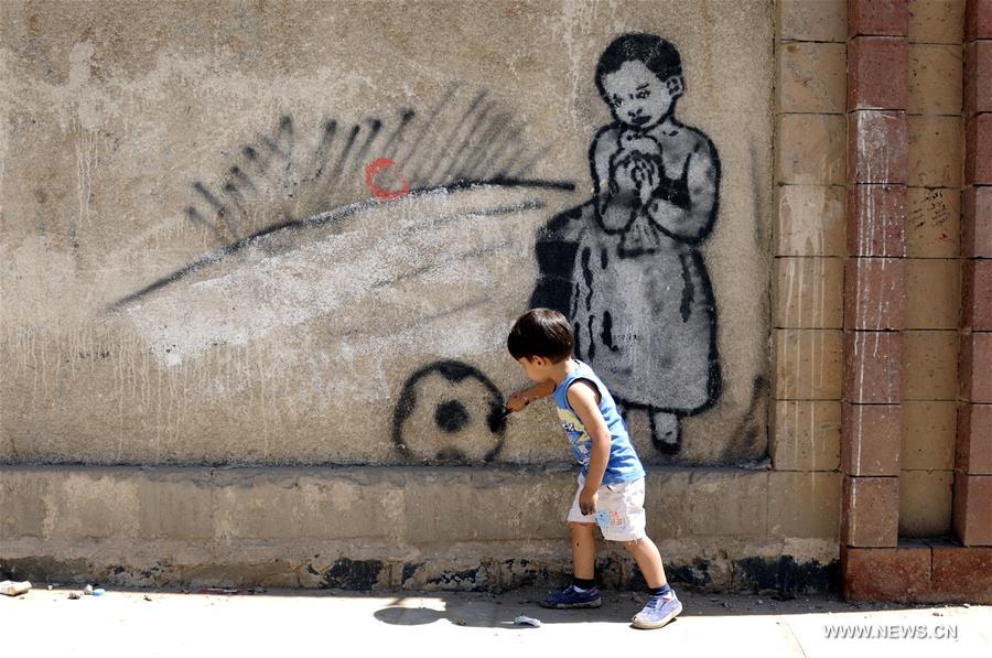 الصورة: حملة للتعبير باستخدام الرسم عن آمال اليمنيين في إحلال السلام ورفض العنف