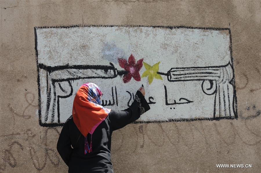 الصورة: حملة للتعبير باستخدام الرسم عن آمال اليمنيين بإحلال السلام ورفض العنف
