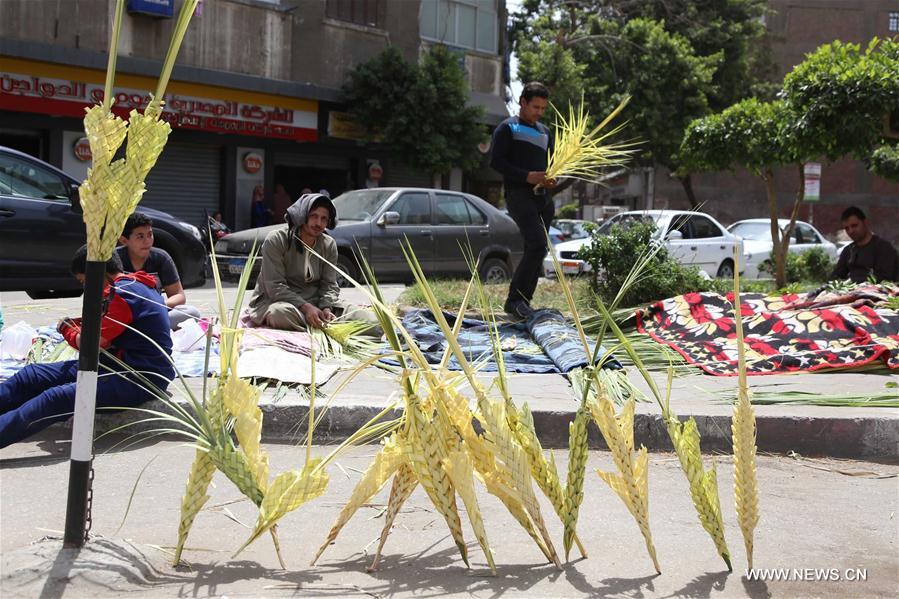 الصورة: الأقباط يحتفلون بـ"أحد السعف" في القاهرة