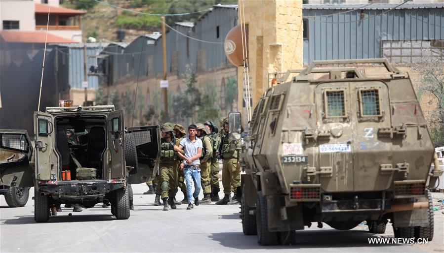 الصورة: مواجهات متفرقة بين فلسطينيين والقوات الإسرائيلية بالضفة الغربية