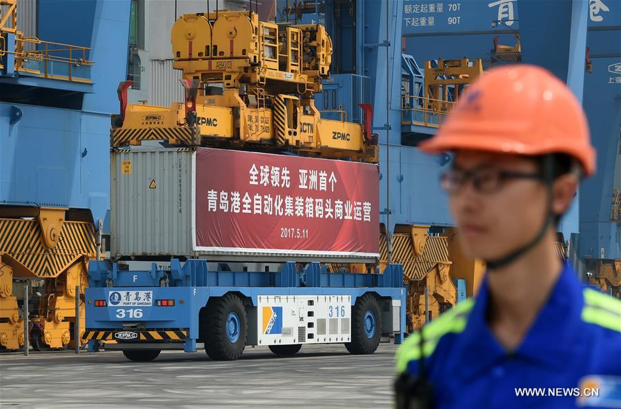 الصورة: محطة كاملة مؤتمتة للحاويات في ميناء تشينغداو تدخل حيز التشغيل التجاري
