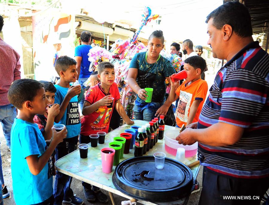 SYRIA-DAMASCUS-CHILDREN-EID AL-FITR-FEAST