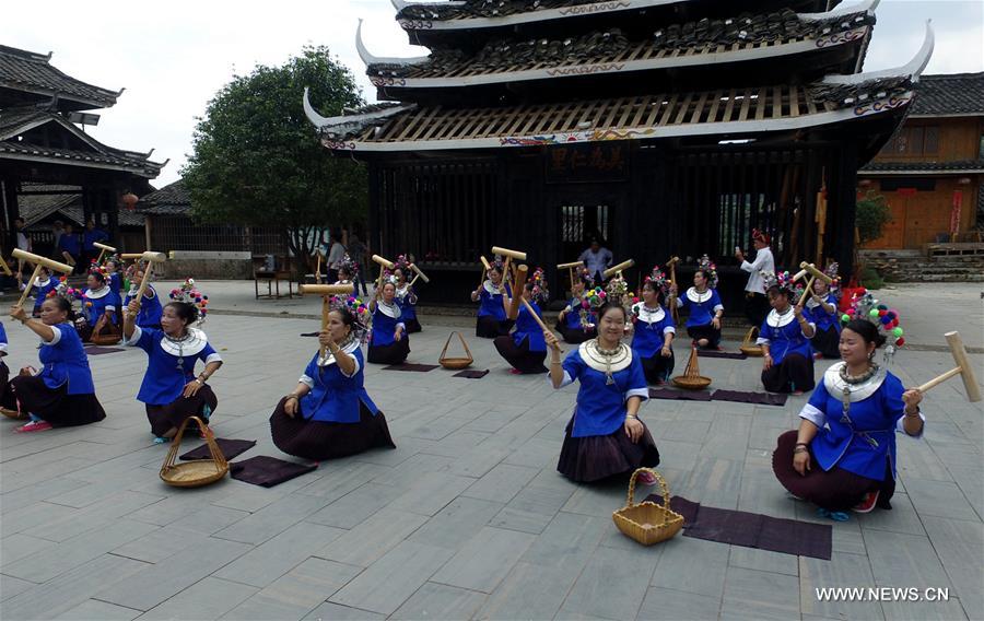 الصورة : التراث غير المادي يجذب المزيد من السياح لجنوبي الصين 
