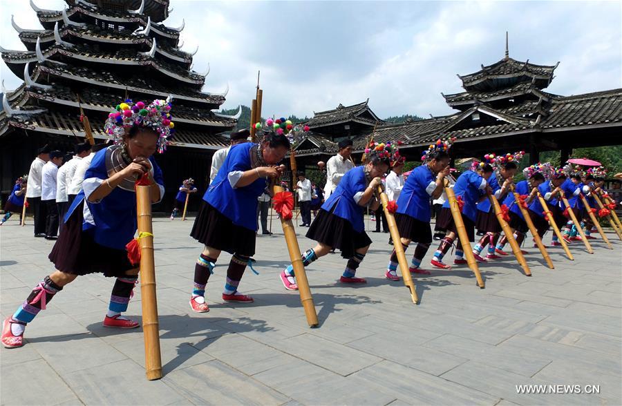 الصورة : التراث غير المادي يجذب المزيد من السياح لجنوبي الصين 