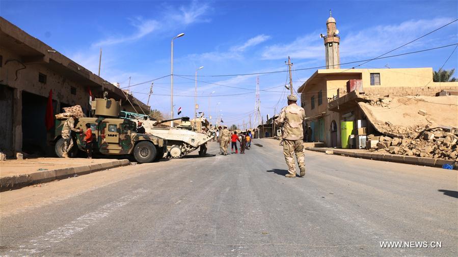 الصورة: القوات العراقية تستعيد راوة آخر معقل لتنظيم داعش في البلاد