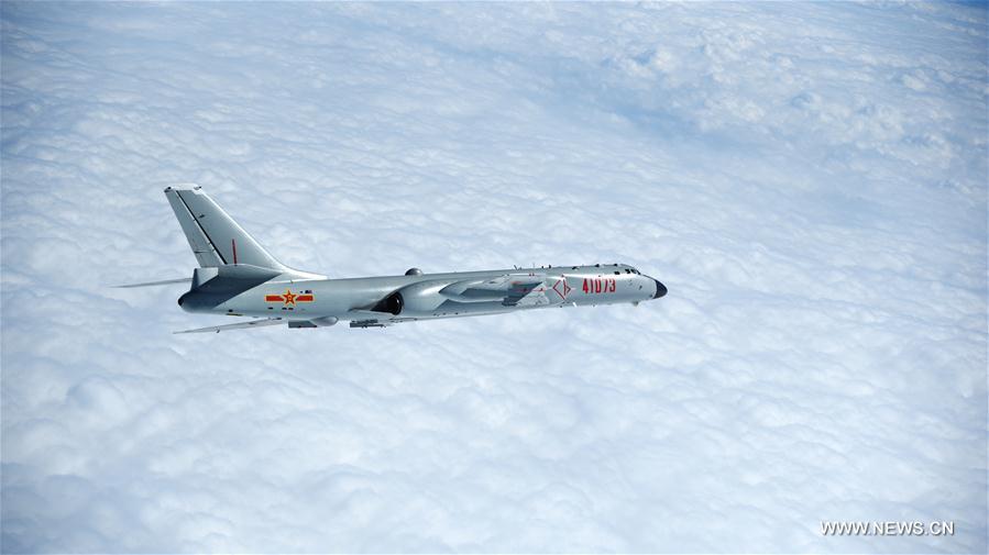 الصورة : القوات الجوية الصينية تقوم بأعمال الدورية في بحر الصين الجنوبي 