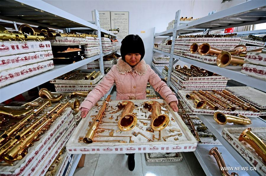 الصورة : إنتاج وتصدير آلات موسيقية غربية في شمالي الصين