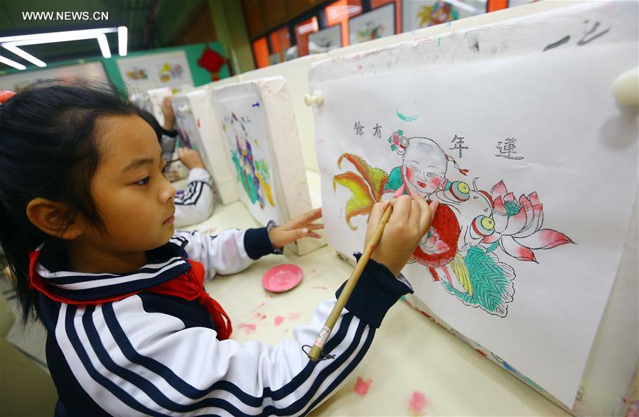 الصورة: دخول التراث الثقافي غير المادي مدرسة ابتدائية بشمالي الصين