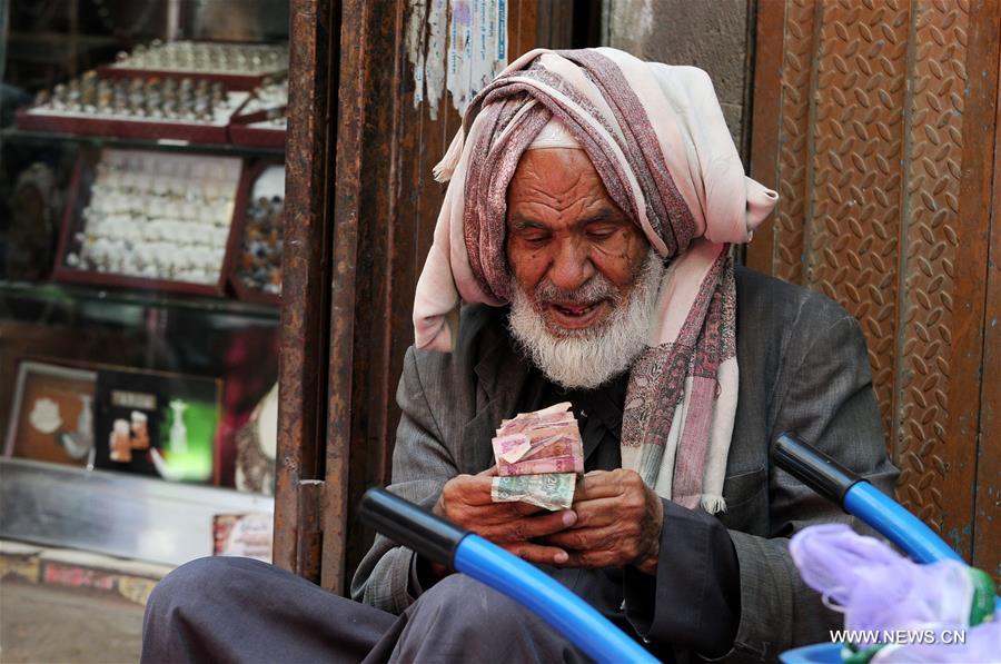 الصورة: اليمنيون يعانون ظروف معيشة صعبة بسبب الحرب الدائرة