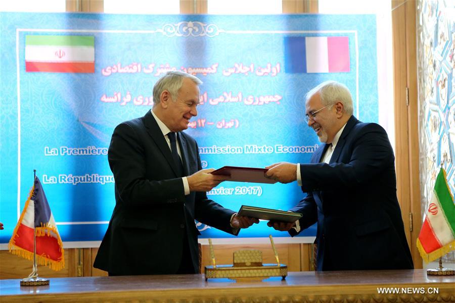 الصورة: فرنسا وإيران توقعان عددا من الاتفاقيات الاقتصادية في عدة مجالات