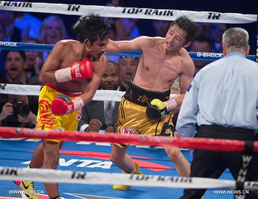 （体育）（5）拳击&mdash;&mdash;邹市明首夺世界拳王金腰带 实现拳击生涯&ldquo;全满贯&rdquo; 